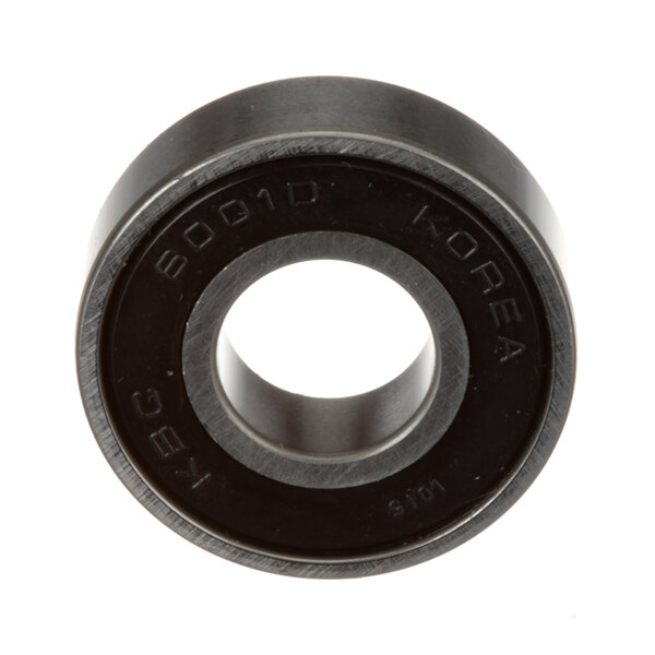 A close-up of a black Univex ball bearing with the letters "KS" on it.