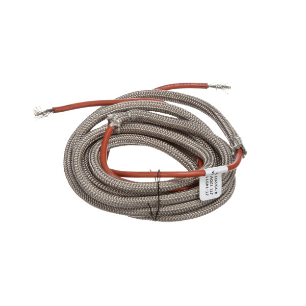 An APW Wyott heat cable with an orange and white cord coiled up.