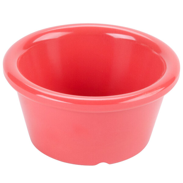 A red melamine ramekin with a lid.