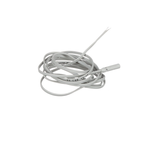 A close-up of a white cable with a white wire attached to it.