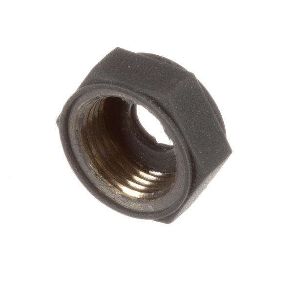 A close-up of a black plastic Groen fastener nut.