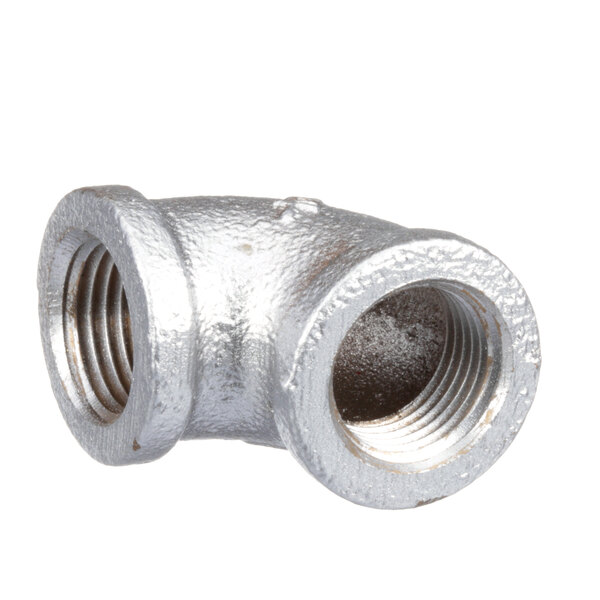 A close-up of a silver metal Blakeslee elbow pipe fitting.