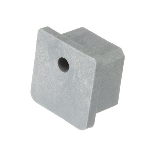 A gray square US Range handle spacer with a hole in it.