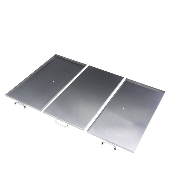 Three Delfield stainless steel lift off covers.