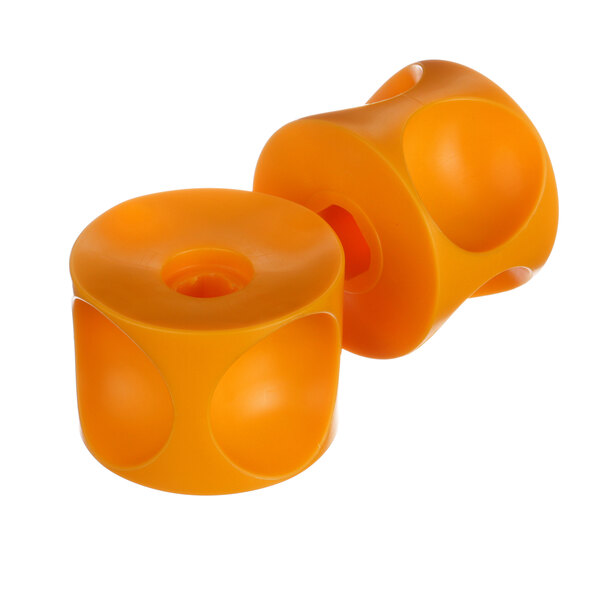 Two orange plastic Zumex Asp pressing cups with holes in them.