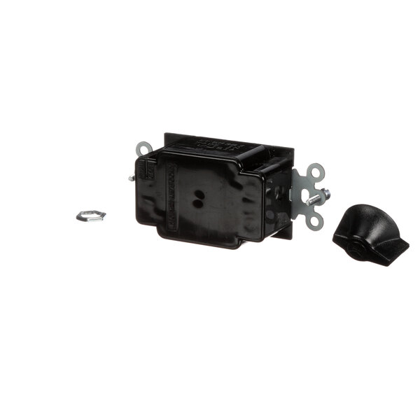 A black plastic electrical box with a hole and a screw cap.