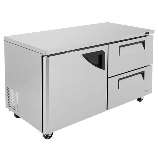 A Turbo Air stainless steel undercounter refrigerator with two drawers.