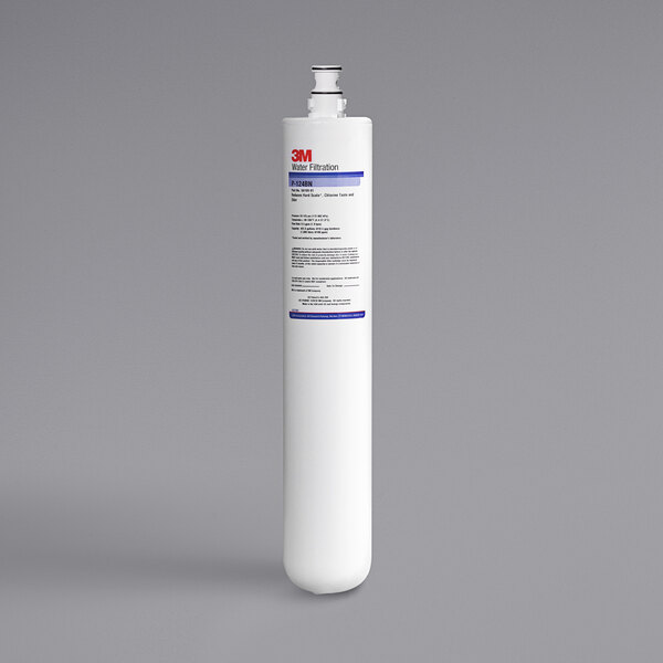 A white cylinder with a blue and black label reading "3M Water Filtration Products P124BN"