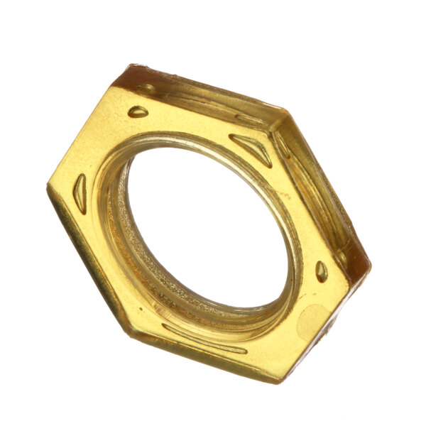 A gold hexagon shaped nut.