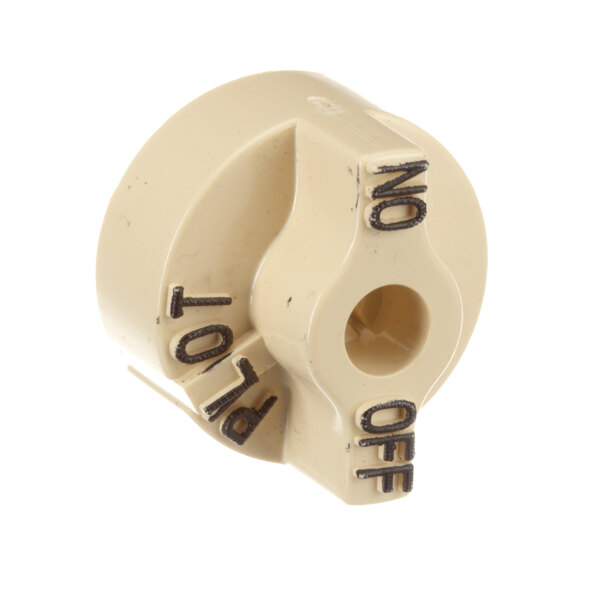 A white plastic Keating knob with black text on it.