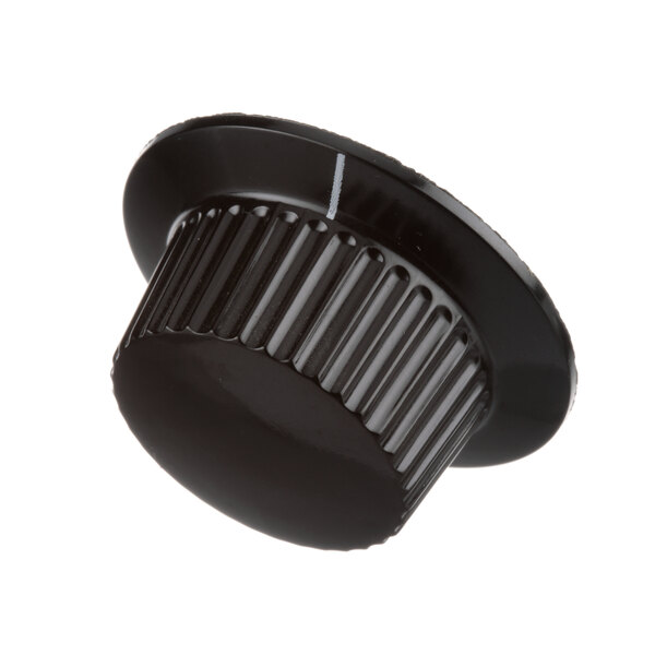 A black plastic knob with a white line.