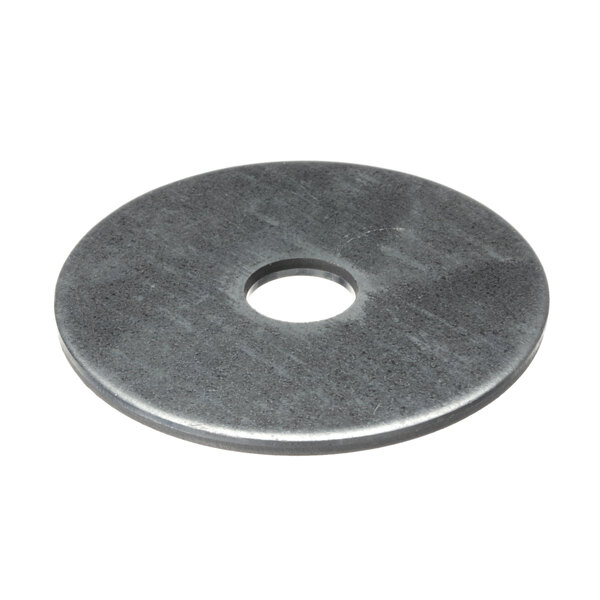 A round metal Salvajor retainer with a hole in the center.