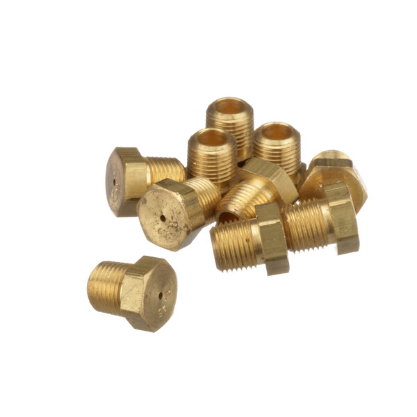 A close up of a gold nut threaded onto a brass bolt.