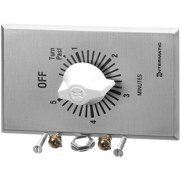 A white and silver Kelvinator timer switch with a white dial.