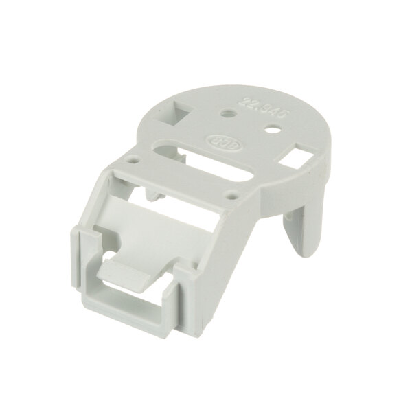 A white plastic True Refrigeration connector bracket with small holes.