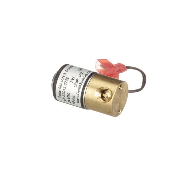 A close-up of a Blodgett quench solenoid, a small metal cylinder with a brass valve and a red wire.