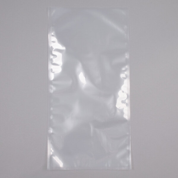 A clear plastic bag of ARY VacMaster chamber vacuum packaging bags on a white surface.