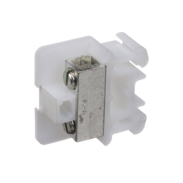 A close-up of a white plastic Cleveland terminal block with metal squares and screws.