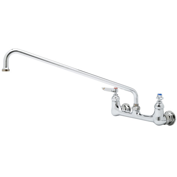 A T&S chrome wall mount pantry faucet with a long metal pipe and Eterna cartridges.