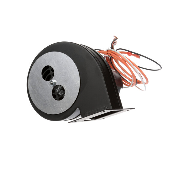 A black and silver electrical device with orange wires.