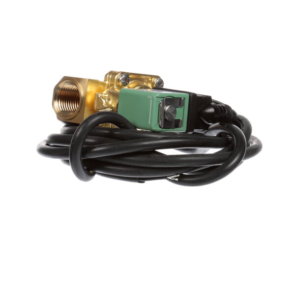 A close up of a green and black InSinkErator solenoid.