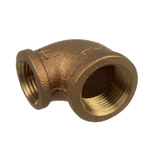 A close-up of a brass Blakeslee pipe elbow.