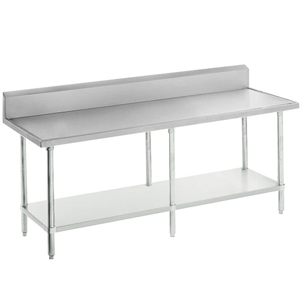 A stainless steel Advance Tabco work table with a backsplash and galvanized undershelf.