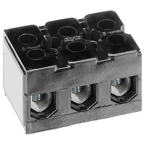 A black Grindmaster-Cecilware terminal block with four sockets.