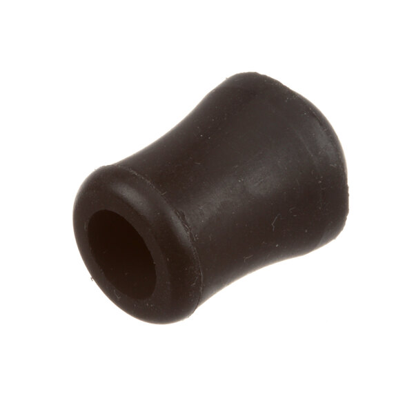 A close-up of a black rubber object with a hole on a white background.