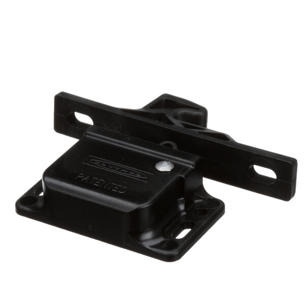 A close-up of a black plastic Wilbur Curtis door latch assembly.