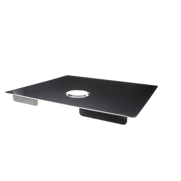 A black metal rectangular plate with a hole in the middle.