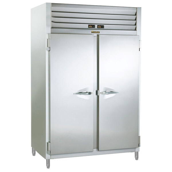 A Traulsen specification line two section convertible freezer/refrigerator with two doors, white in color.