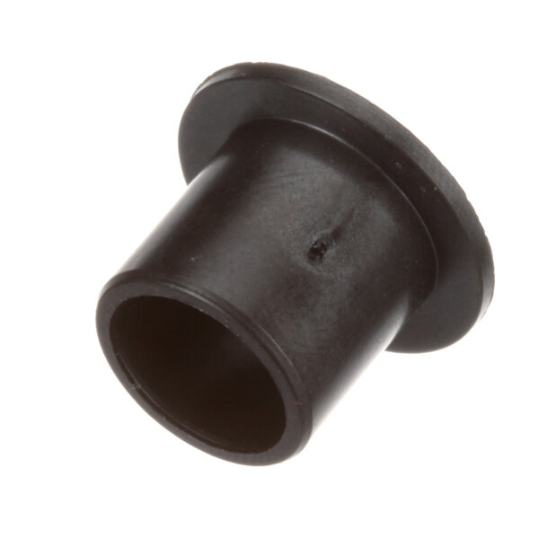 A black flanged polymer bearing with a hole in it.
