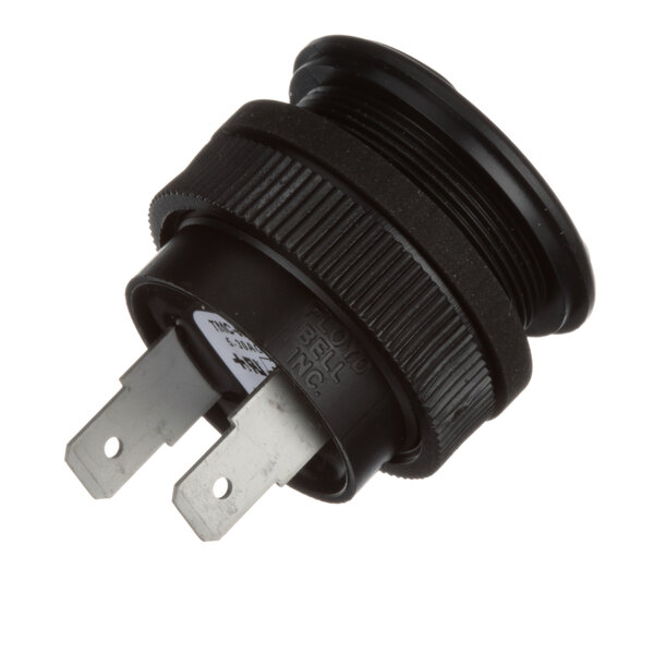 A black Accutemp piezo electric alarm plug with two wires.