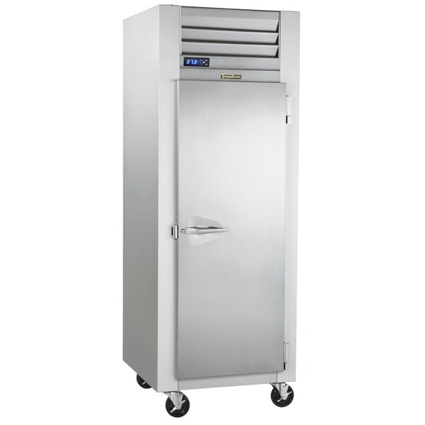 A Traulsen G Series reach-in freezer with a white metal door and a handle.