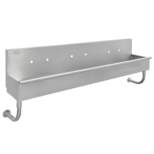A stainless steel wall mounted Advance Tabco hand sink with three faucets over a metal shelf.