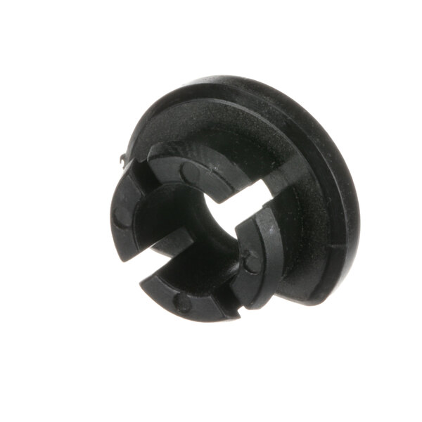 A black plastic Anthony hinge pin bushing with a hole in the middle.