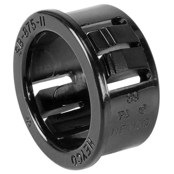 A black plastic Heyco bushing with white text and two holes.