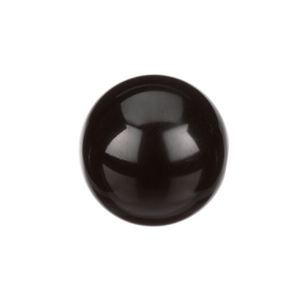 A close-up of a black ball on a white background.