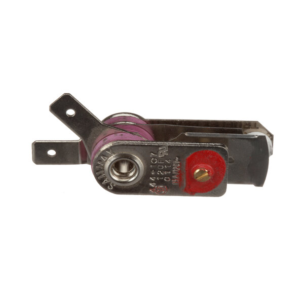 A close-up of a small red and black metal switch on an APW Wyott Limit Switch.