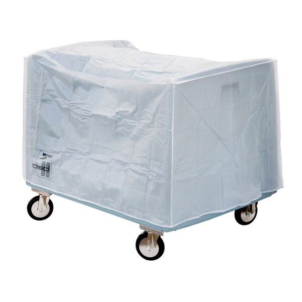 A white plastic covered Metro dish and tray cart on wheels.