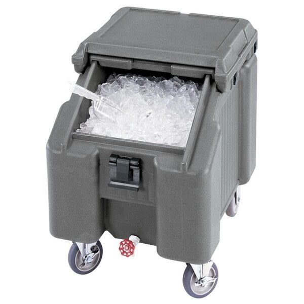 A granite gray Cambro mobile ice bin with a sliding lid and ice inside.