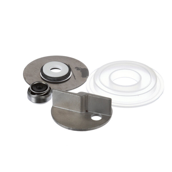 A Grindmaster-Cecilware pump seal kit with a metal and rubber seal.