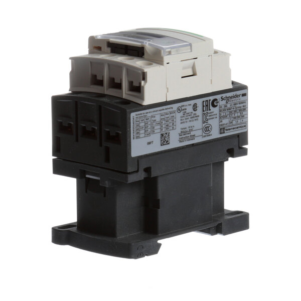 A close-up of a black and white Baxter contactor with white buttons.