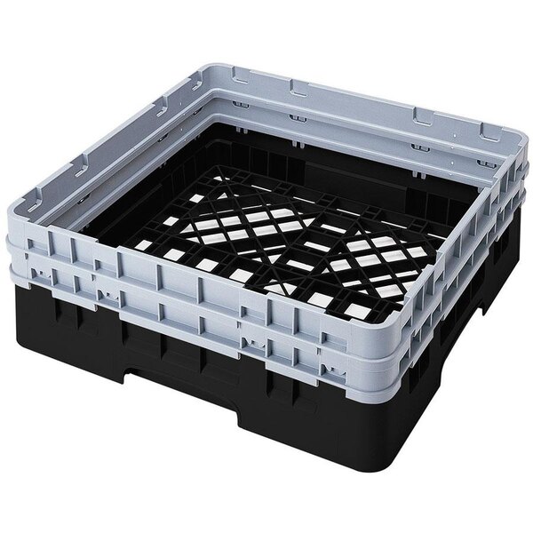 A black plastic Cambro dish rack with closed sides and 2 extenders.