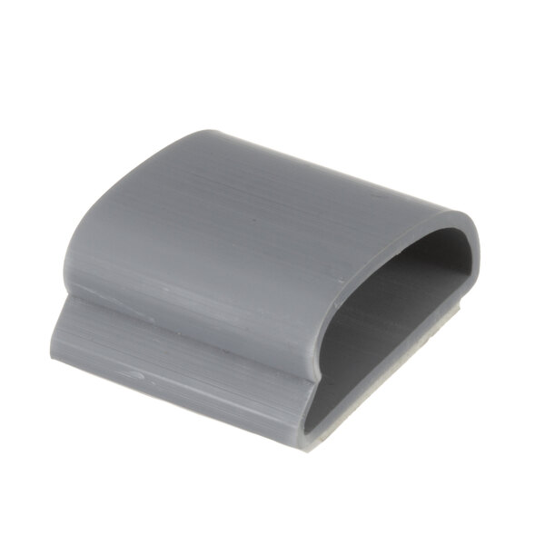 A grey plastic Cleveland clip with a small hole.