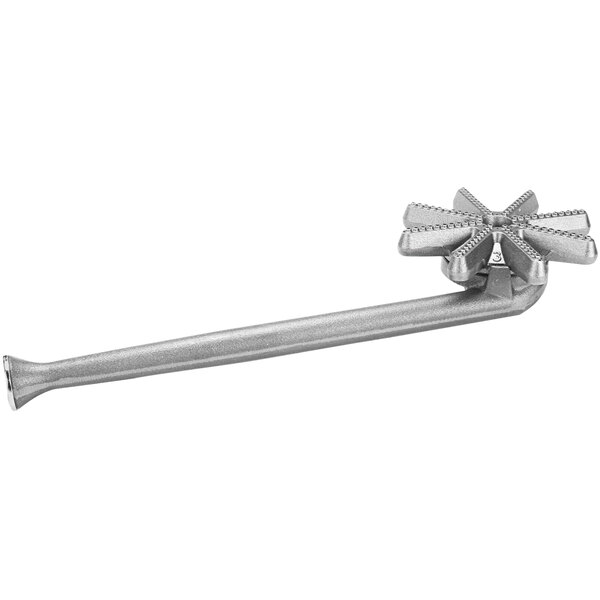 A silver Montague rear burner assembly with a long metal bolt.