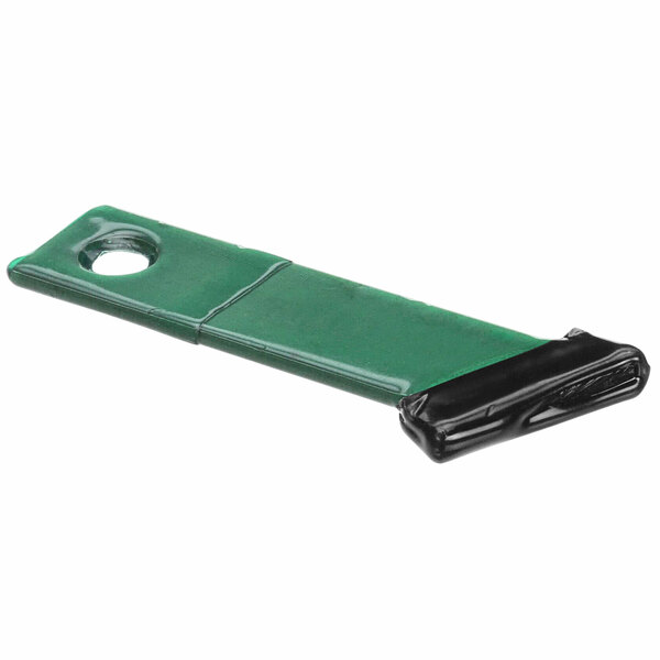 A close-up of a Capkold green and black plastic knife.