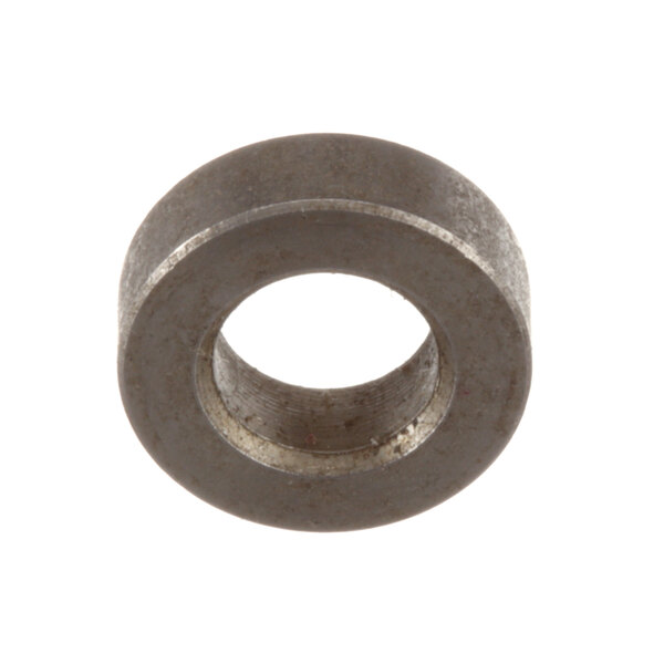 A close-up of a round metal Cleveland spacer.