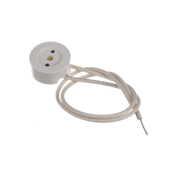 A white round Federal Industries lamp socket with a cord attached.